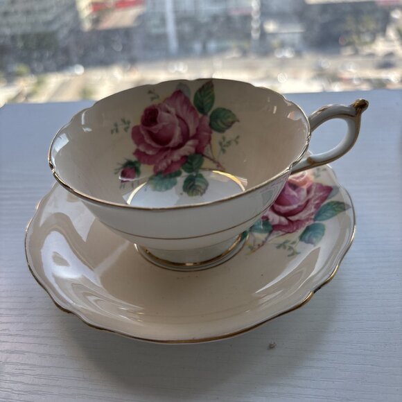 Beautiful Vintage Paragon Pale Yellow and Pink Rose teacup and Saucer
